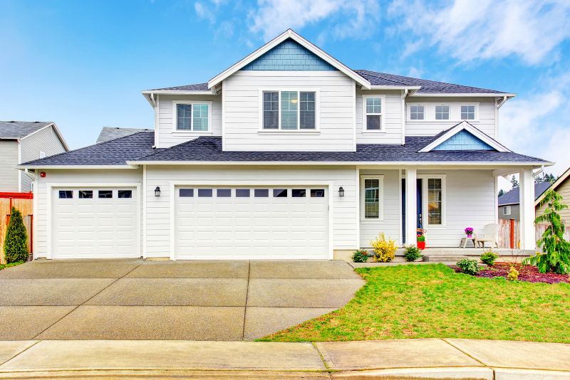 spacious concrete driveway for a family home